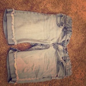 Cat and Jack, light colored Bermuda shorts.